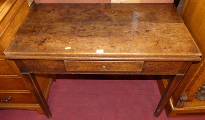 Lot 1273 - An early 19th century provincial oak foldover...