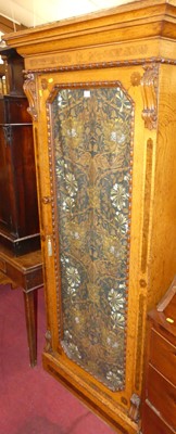 Lot 1274 - An oak and burr oak inlaid single door glazed...