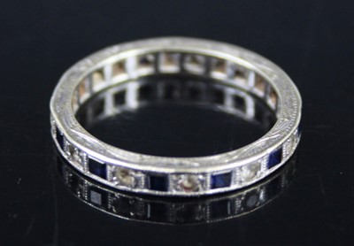 Lot 448 - A 9ct white gold, blue and white sapphire set...