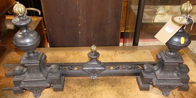 Lot 1282 - A 19th century cast iron, brass finialled, and...