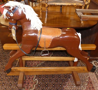 Lot 1290 - A child's painted carved wood rocking horse,...