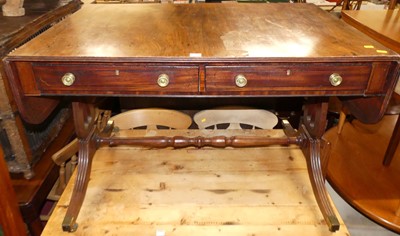 Lot 1299 - A 19th century mahogany sofa table, having...