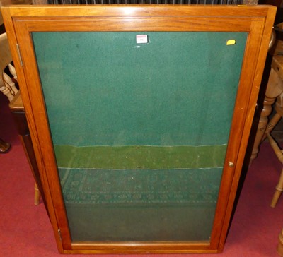 Lot 1302 - A hardwood single door glazed wall mounted...