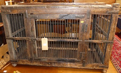 Lot 1304 - A rustic stained hardwood and metal bound cage,...