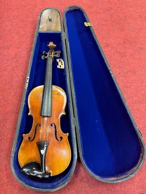 Lot 661 - A cased violin in wooden box