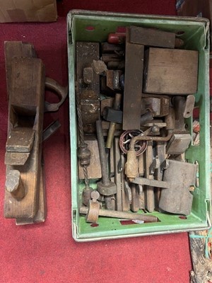 Lot 672 - A box of tools to include planes, saws etc