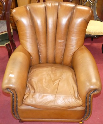 Lot 1338 - A contemporary tan leather upholstered...