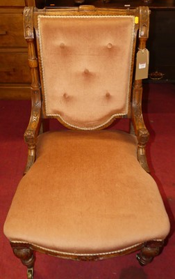 Lot 1345 - A Victorian oak framed nursing chair, having...