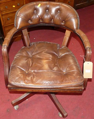 Lot 1353 - A contemporary mahogany and tan leather...