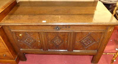 Lot 1360 - An 18th century joined oak three panelled...