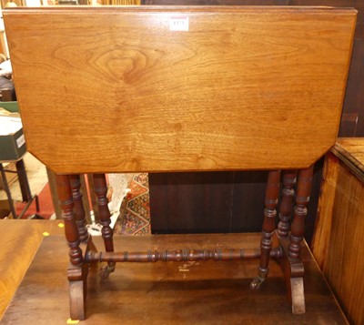 Lot 1373 - An Edwardian walnut Sutherland table, on ring...