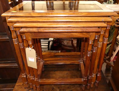 Lot 1386 - A contemporary teak quartetto nest of...