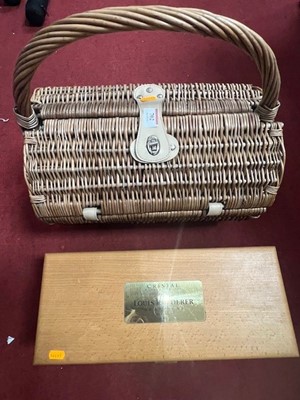 Lot 702 - A two-place wicker picnic basket, and an empty...