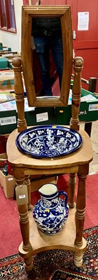 Lot 1401 - A rustic pine freestanding washstand with jug...