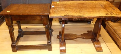 Lot 1404 - An oak trestle end low occasional table,...