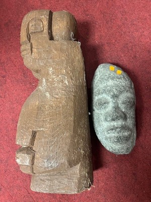 Lot 713 - A carved stone head in Columbian style...