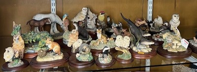 Lot 610 - A collection of Border Fine Arts animal figure...