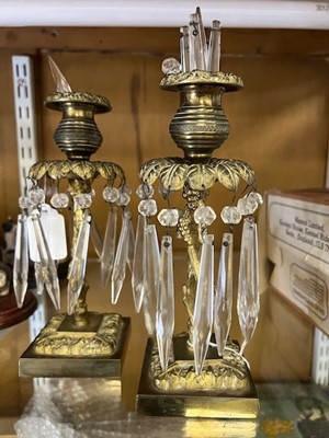 Lot 611 - A pair of brass lustre table candlesticks,...