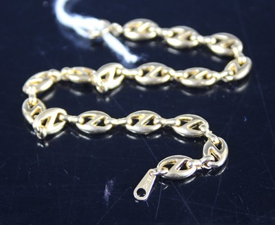 Lot 407 - A gold plated lobster link bracelet, 18.9cm