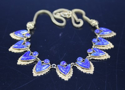 Lot 409 - A gilt metal and blue enamel necklet, 40cm