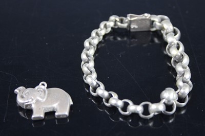 Lot 411 - A white metal belcher link bracelet; together...