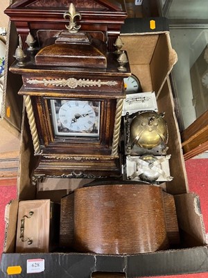 Lot 628 - A collection of clocks to include a1930s oak...