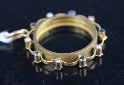 Lot 419 - A yellow metal, sapphire and seed pearl set...