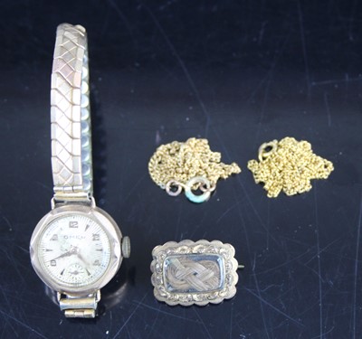 Lot 420 - A vintage lady's 9ct gold cased wristwatch, on...