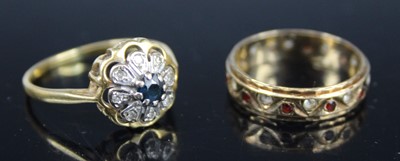 Lot 463 - A modern 18ct gold sapphire and diamond point...