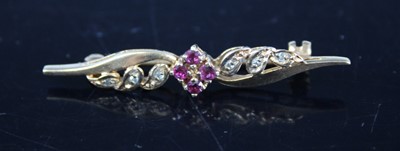 Lot 425 - A modern 9ct gold ruby and diamond point set...