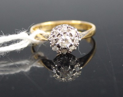 Lot 428 - An 18ct gold diamond flower head cluster ring,...