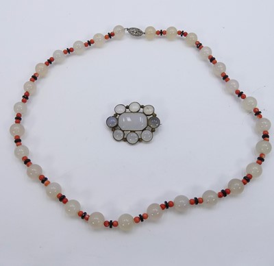 Lot 310 - A beaded moonstone and coral necklace;...