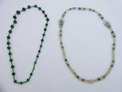 Lot 314 - A beaded malachite long necklace; together...