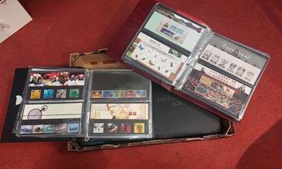 Lot 523 - A collection of Royal Mail presentation packs...