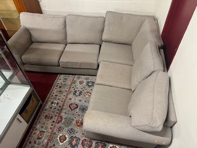 Lot 1427 - A contemporary grey fabric upholstered corner...