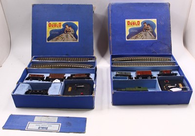 Lot 276 - Two Hornby Dublo 3 rail sets, including an...