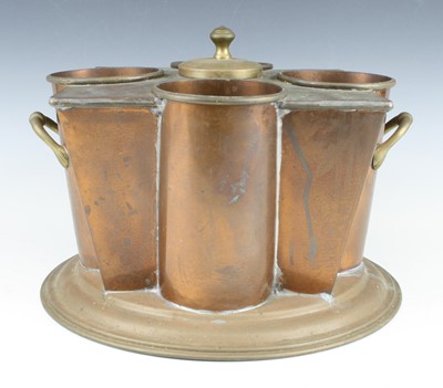 Lot 224 - A 20th century copper and brass quatrefoil...