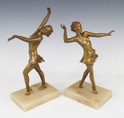 Lot 227 - After Josef Lorenzl - a pair of Art Deco gilt...