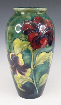 Lot 101 - A large Moorcroft Hibiscus pattern pottery...