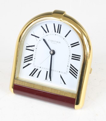 Lot 216 - A Cartier gilt metal alarm clock, the case of...