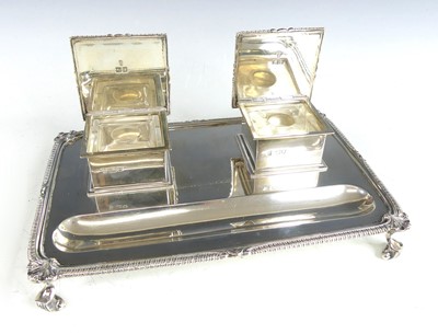 Lot 2201 - A George V silver inkstand, comprising two...