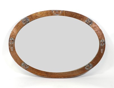 Lot 421 - An Arts & Crafts wall mirror, circa 1900, of...