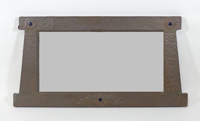 Lot 420 - An Arts & Crafts wall mirror in the manner of...