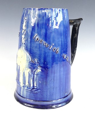 Lot 2089 - A Castle Hedingham blue glazed pottery tankard,...