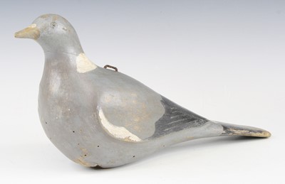 Lot 857 - A 20th century carved and painted pine decoy...