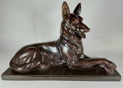 Lot 4 - A large Art Deco plaster recumberant alsatian dog