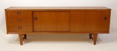 Lot 442 - A 1960s Danish teak long sideboard, having...