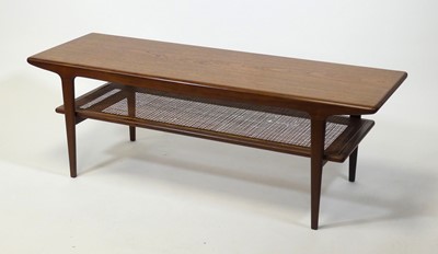 Lot 457 - A 1960s teak long coffee table, having rounded...