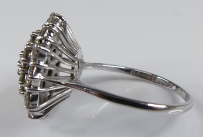 Lot 2502 - An 18ct white gold diamond circular cluster...