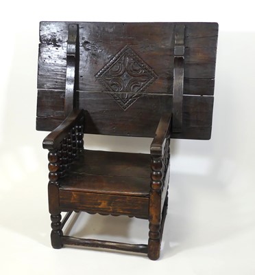 Lot 2544 - An antique joined oak monk's seat, 17th...